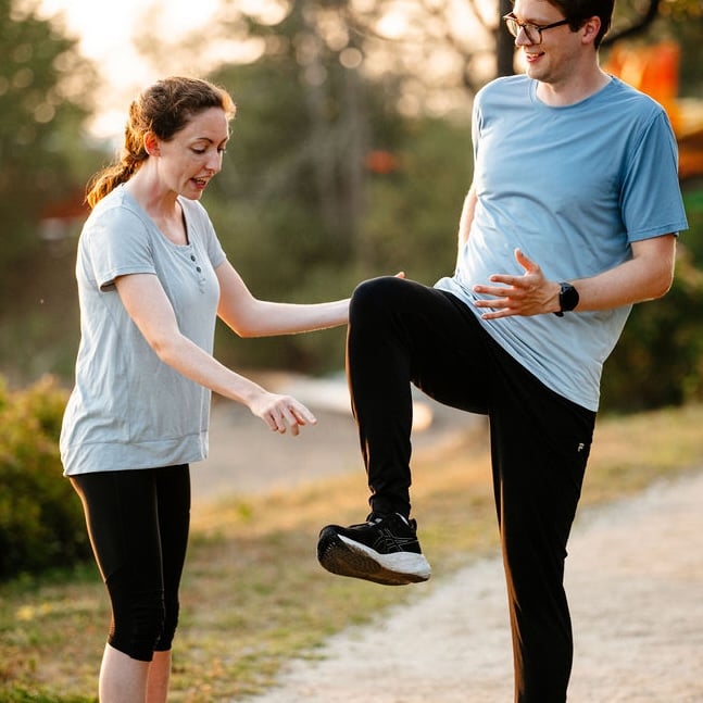 Dr. Aisling Cuffe working with someone on running injury prevention drills. Dr. Aisling Cuffe working with someone on running injury prevention drills.
