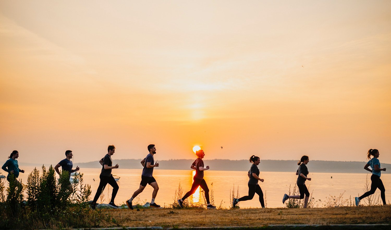 The Steady State team running along the Eastern Prom in Portland Maine at sunrise.