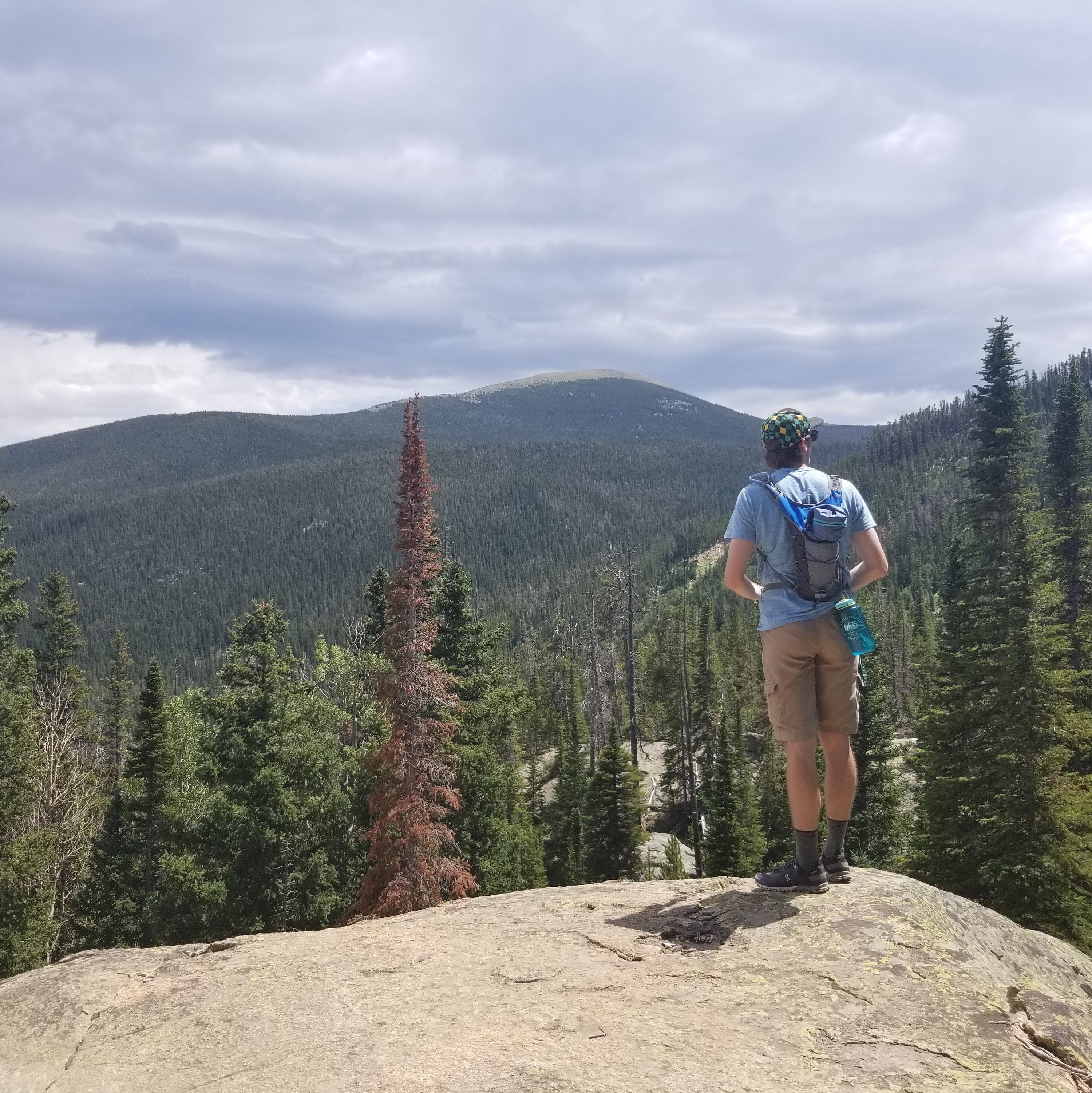 Dr. Mike on a hike in the mountains.