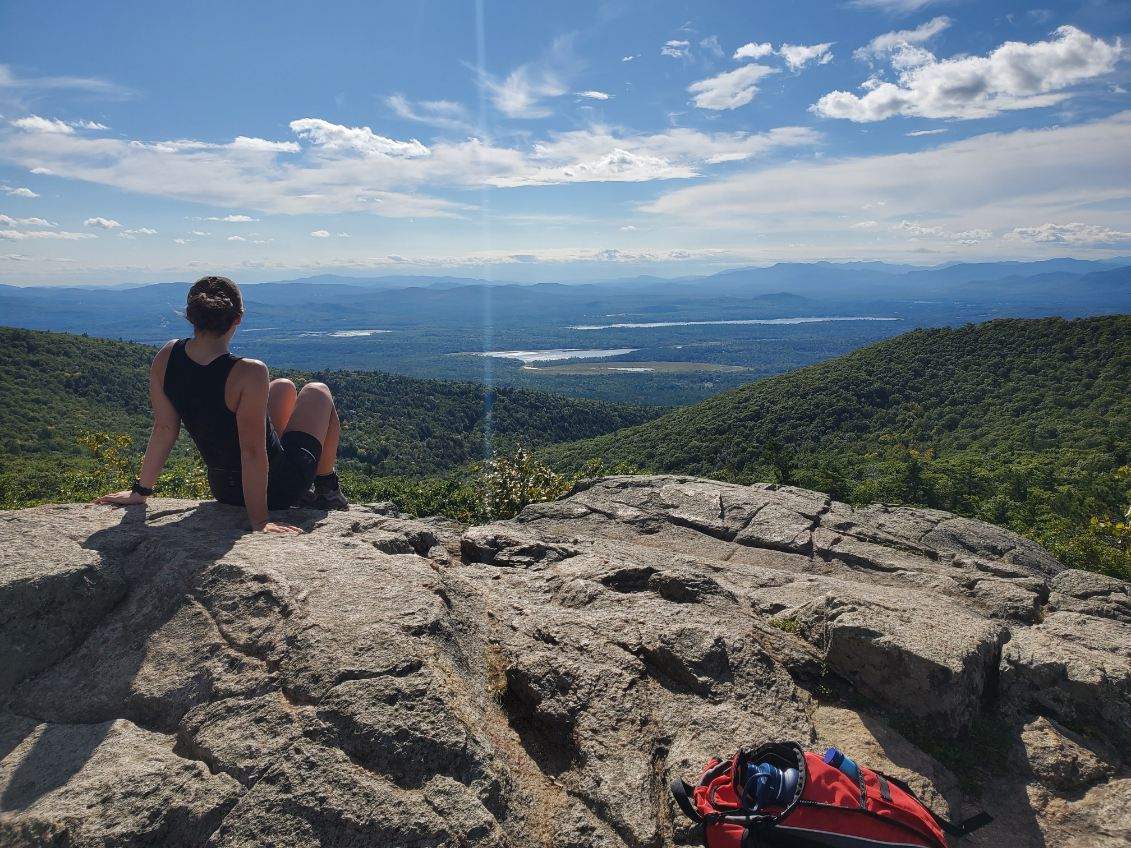 Dr. Tori Panian on a hike in the mountains.
