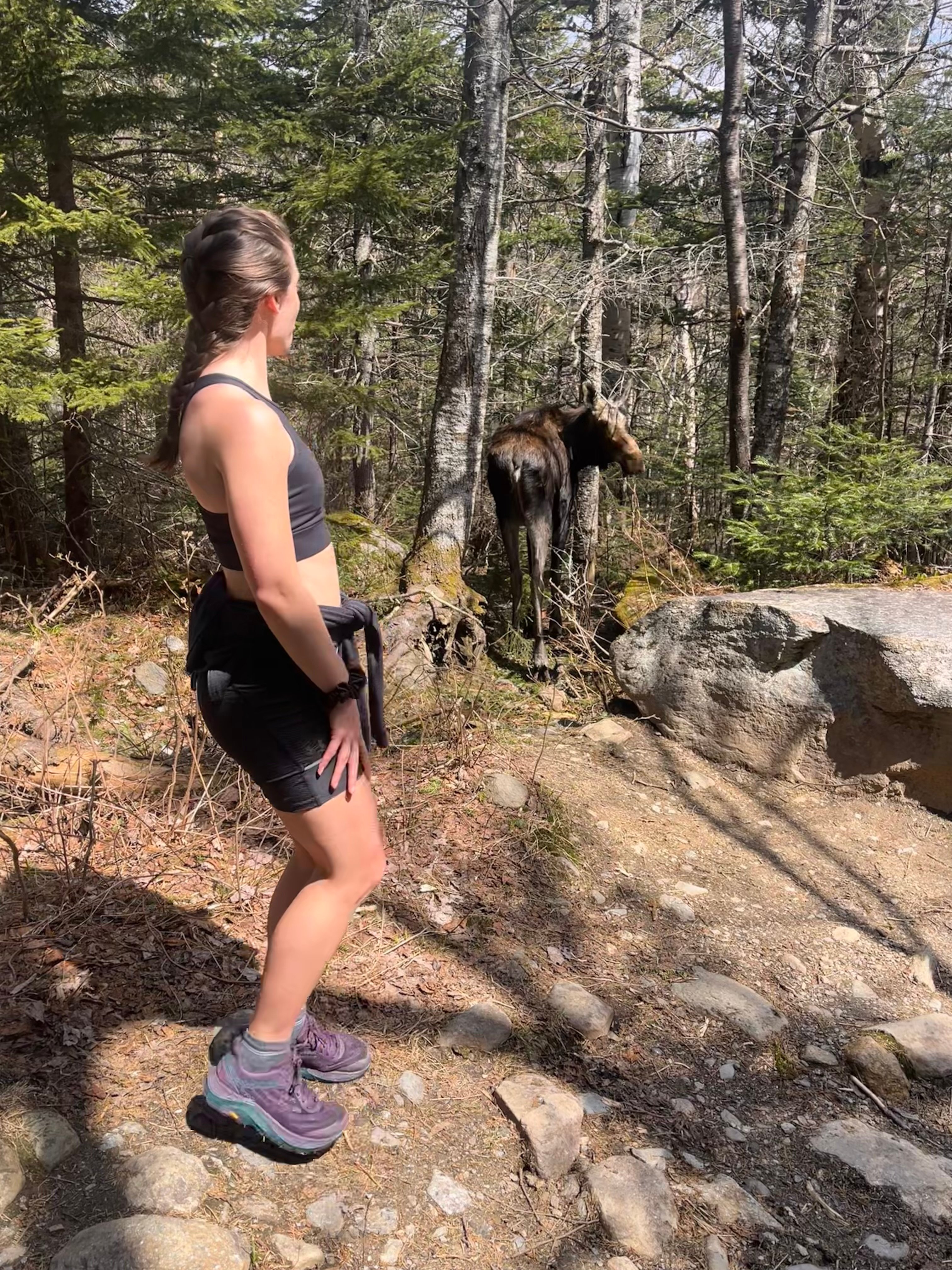 Dr. Victoria Panian on a hike with a moose