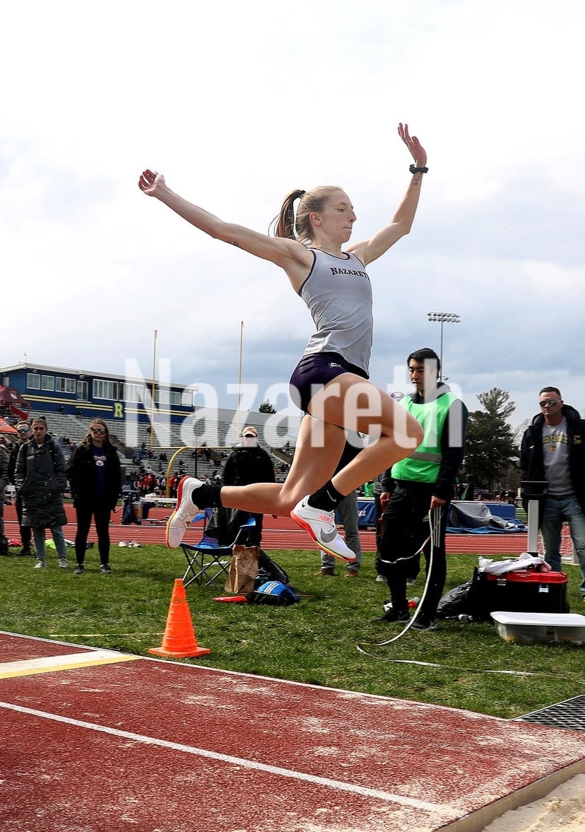 Brenna long jumping for Nazareth University.