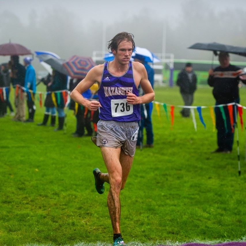 Dr. Mike running a cross country race.