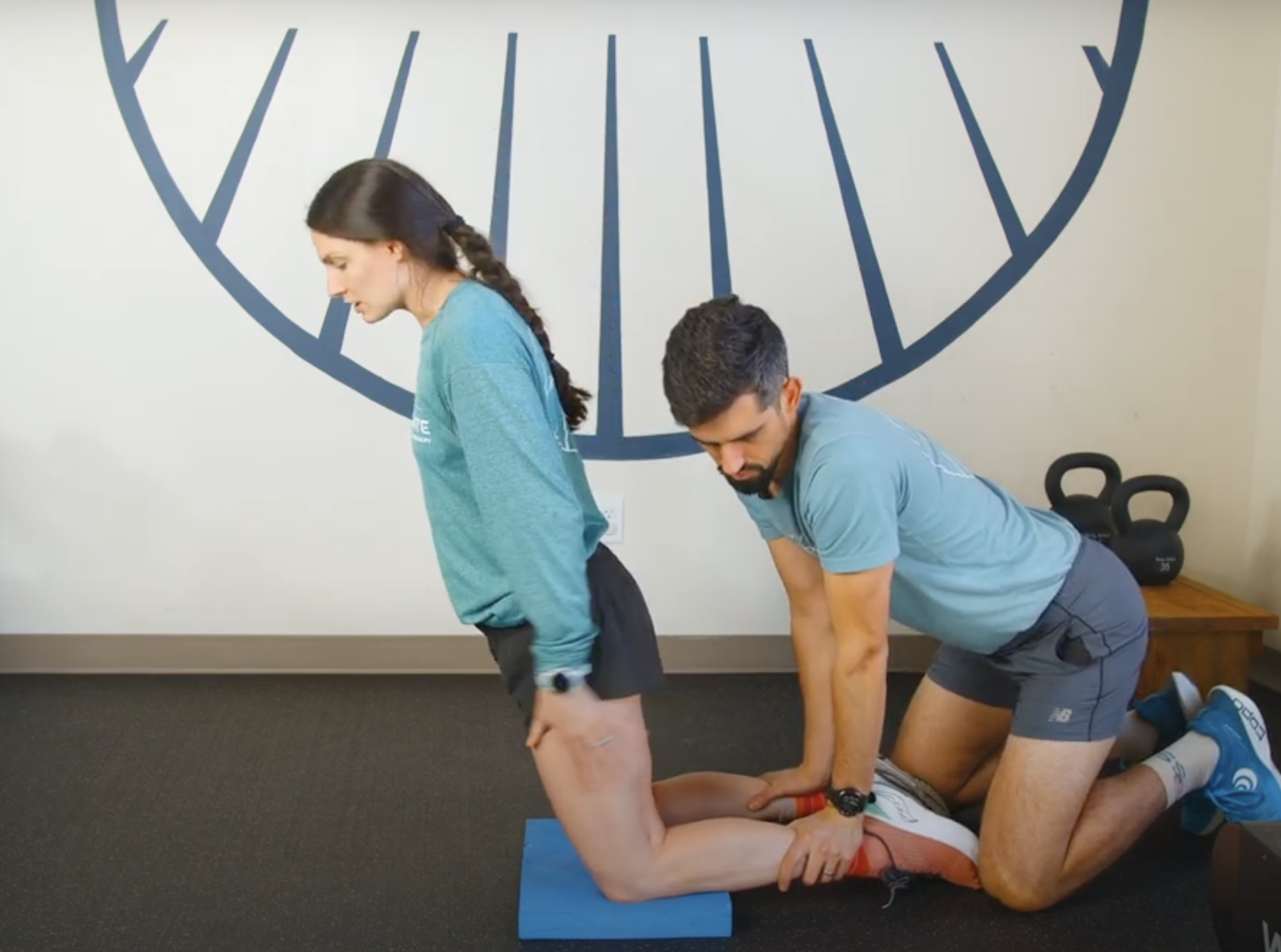 Ashten & Kelton demonstrating a Nordic Hamstring exercise - which can be a great strengthening exercise for runners with chronic hamstring injuries.