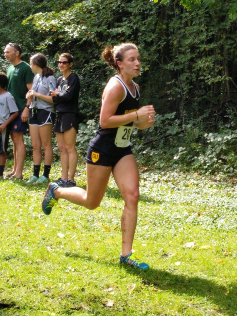Dr. Victoria Panian running a cross country race. Dr. Victoria Panian running a cross country race.